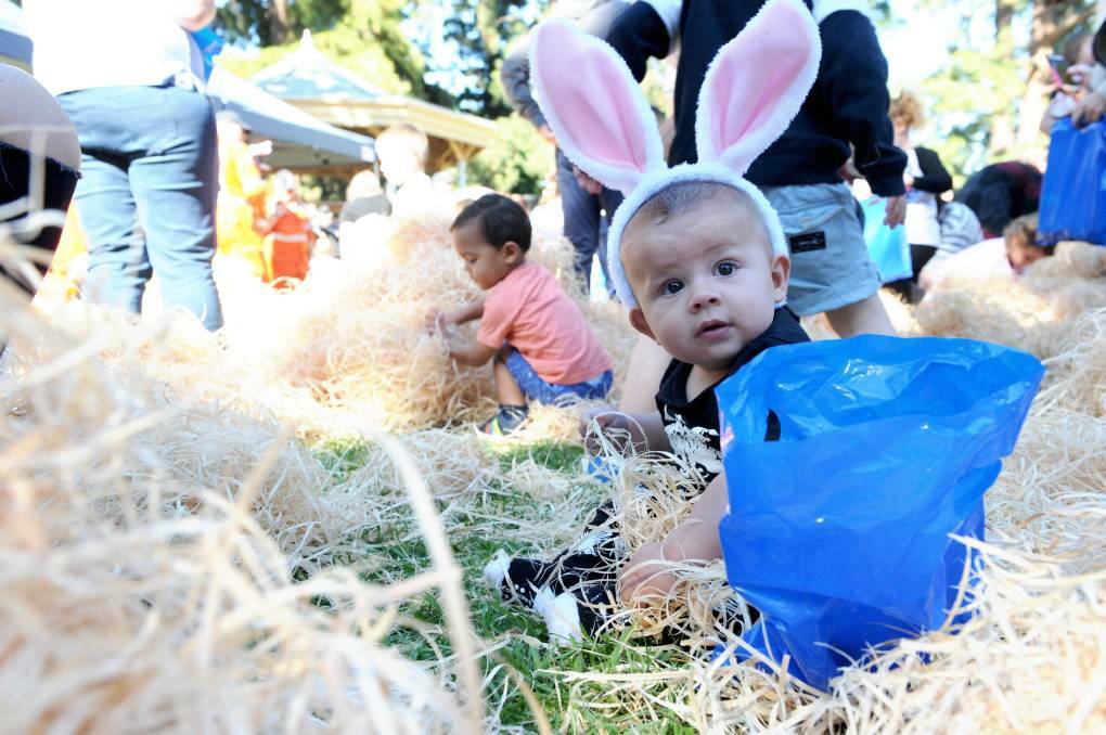 Arie Pope enjoying hunting for Easter eggs in Bendigo on Good Friday. Picture: NONI HYETT