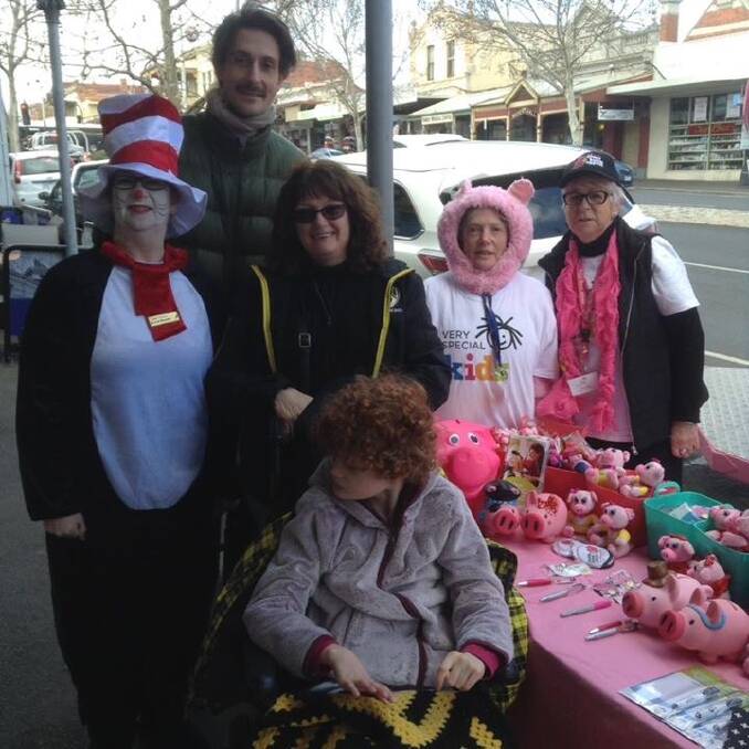 Commonwealth Bank employees and community members help raise support for Very Special Kids at an event in Eaglehawk. Picture: SUPPLIED