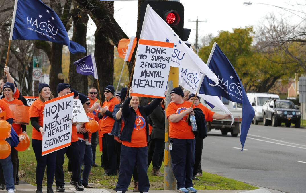 Public sector mental health workers rallied outside Bendigo hospital on Friday about ongoing enterprise agreement negotiations. Pictures: EMMA D'AGOSTINO