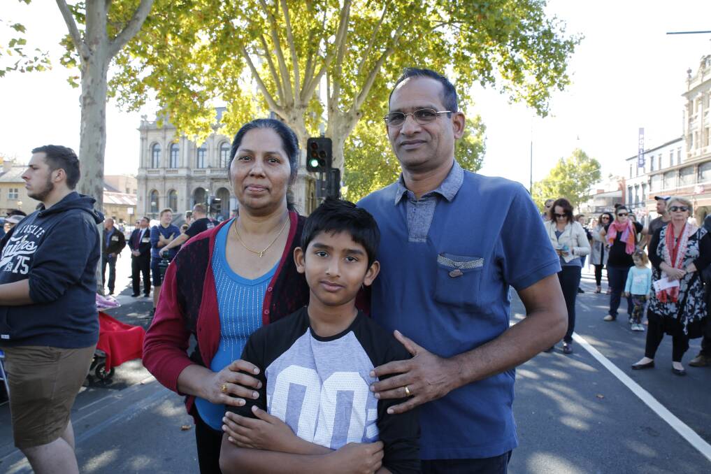 Alen Johny, 10, was keen to attend an Anzac Day service to pay his respects. His parents Lily and Mattathil were only too happy to oblige. Picture: EMMA D'AGOSTINO
