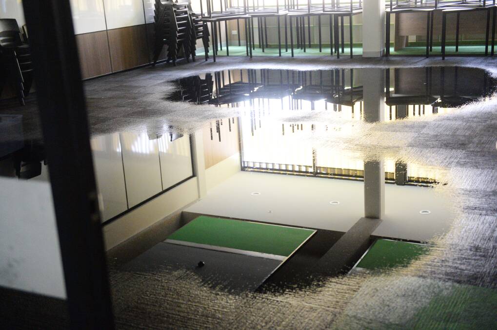 Three floors of a block of classrooms used by junior school students were flooded. Picture: DARREN HOWE