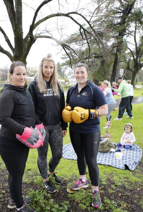 FIT BIT: 3T Fitness Bendigo trainer Bronwen Egglestone with boot campers Hannah Garth and Hannah Perry. They are concerned about their training spot at Lake Weeroona.