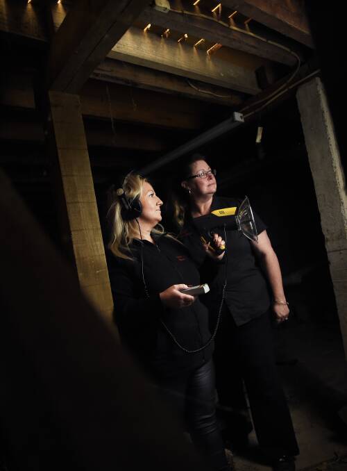 Bump in the night: Paranormal investigators Sam Gray and Deb Robinson at Blackwood Hotel. They believe the pub is haunted. Picture: Luka Kauzlaric 