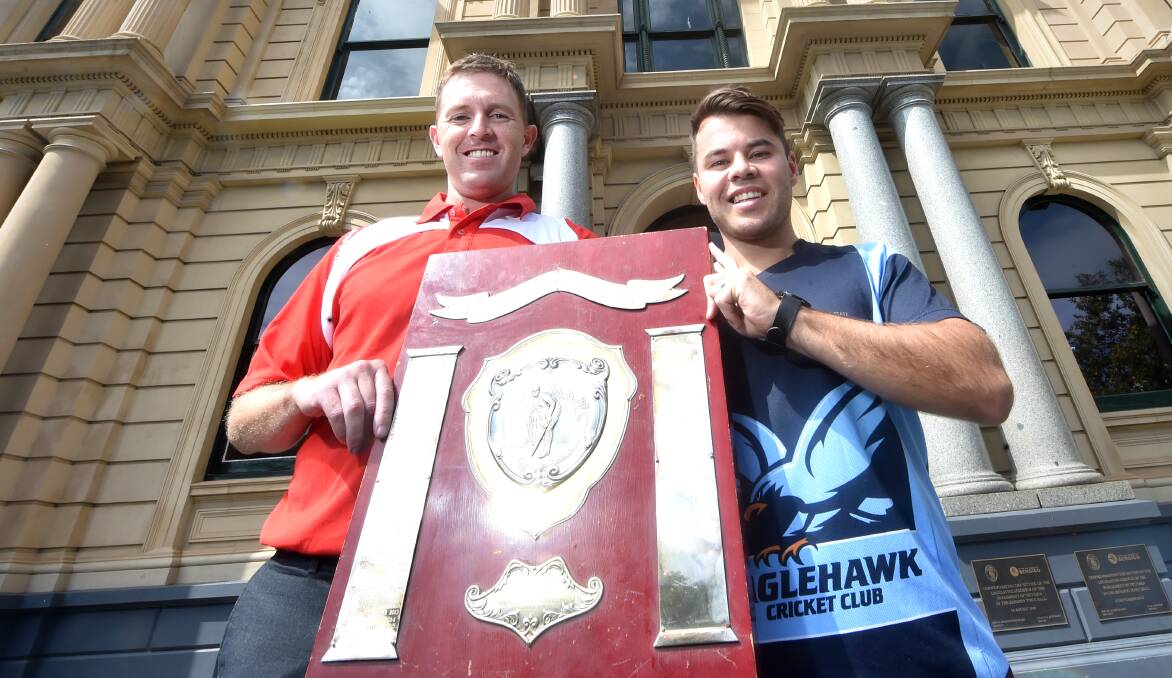 PRIZE UP FOR GRABS: Bendigo United captain Leigh McDermott and Eaglehawk skipper Cory Jacobs with the BDCA premiership shield. Picture: DARREN HOWE