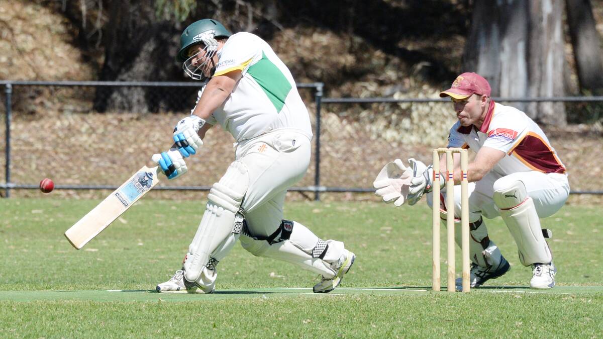 WHACK: Spring Gully's Damien Venville hits over the top during his innings of 15 against Maiden Gully on Saturday. Picture: DARREN HOWE