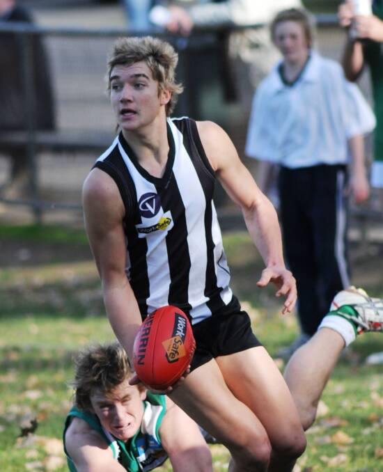 YOUNG BULL: Dustin Martin playing for Castlemaine against Kangaroo Flat during 2008. Martin won the Bendigo league Rising Star Award in his debut senior season for the Magpies under coach Jamie Elliott. Martin also topped the Magpies' goalkicking with 22.
