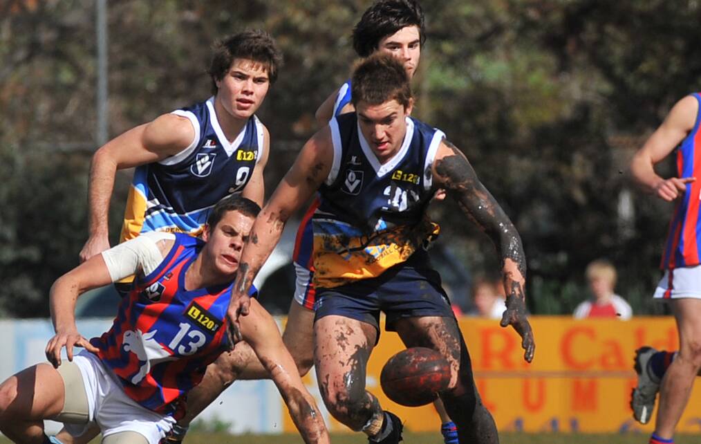 DETERMINED: Dustin Martin playing for the Bendigo Pioneers in 2009 against Oakleigh.