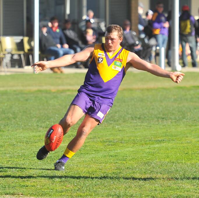CLEARING KICK: Bears Lagoon-Serpentine's Brodie Hawke moves the ball out of the defensive 50 early on Saturday against Pyramid Hill. Picture: LUKE WEST