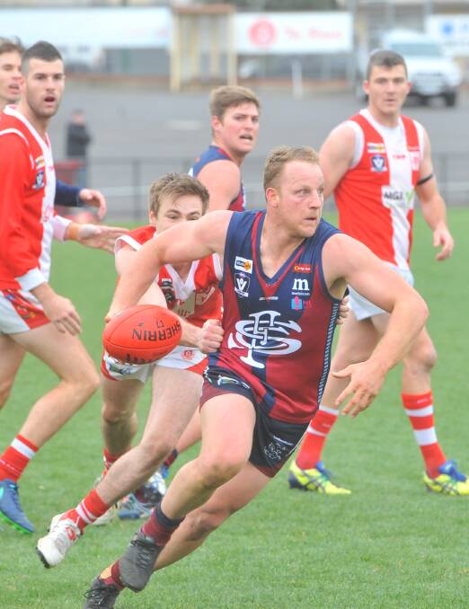 LEADING FROM THE FRONT: Blair Holmes played a superb captain's game in Sandhurst's crucial victory over South Bendigo on Saturday. Picture: ADAM BOURKE