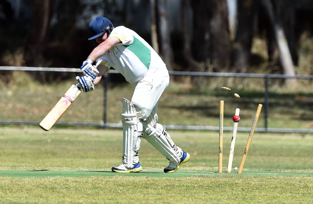 ROUGH DAY: This picture of Des Gilmore being clean bowled for a duck encapsulates Spring Gully's innings on Saturday. Picture: GLENN DANIELS