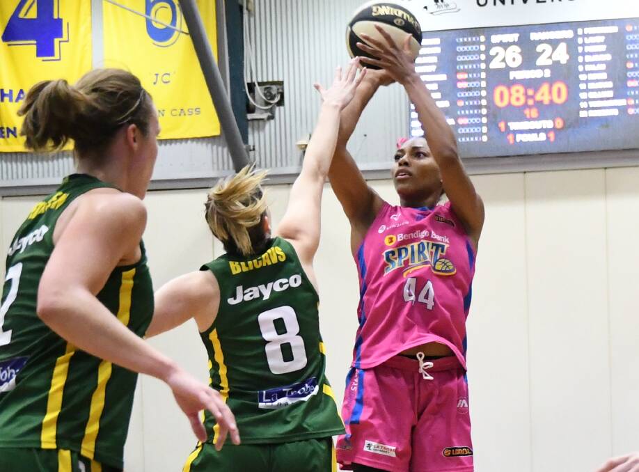 ON TARGET: Betnijah Laney scores two of her 18 points against Dandenong on Saturday night. Picture: LUKE WEST
