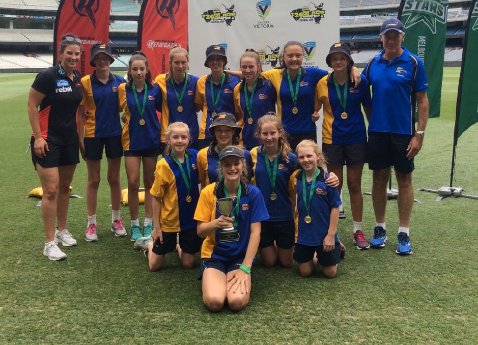 CHAMPIONS: Members of the victorious Bendigo South East College Year 7 girls cricket team on the MCG. Pictures: CONTRIBUTED