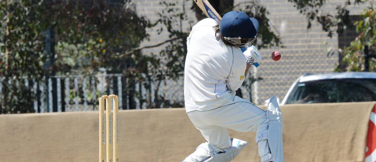 AWKWARD: Eaglehawk's Shane Murdoch tries to evade a delivery against Bendigo in his innings of 34 during the Hawks' batting debacle. Picture: DARREN HOWE