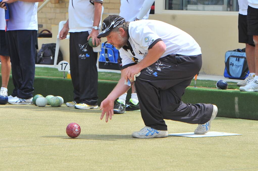 DETERMINED: Castlemaine's Paul Darroch bowls in Saturday's round 14 match against Bendigo. The Maine was beaten 106-90 to slip from second to fourth.