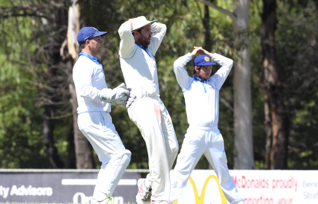 CLOSE CALL: Golden Square's Scott Johnson, captain Ben Gunn and Kyle Chant rue a near-miss against White Hills on Saturday. Golden Square won by 64 runs on first innings. Picture: NONI HYETT