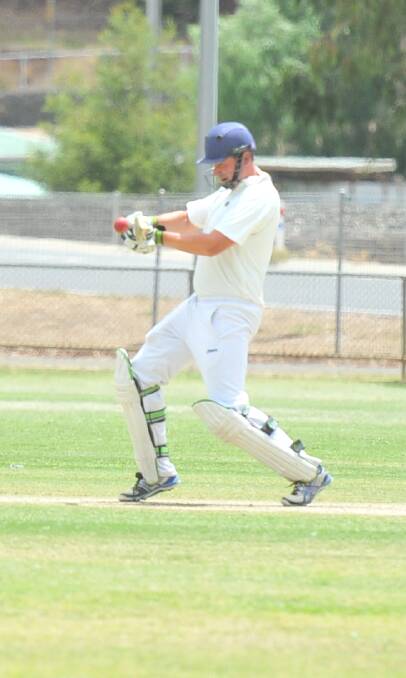STELLAR SEASON: Sandhurst captain Craig Howard plays a cut shot against Strathdale-Maristians during an innings in which he made 132. Picture: LUKE WEST