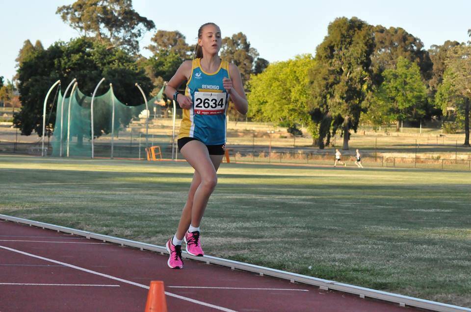 POWERING AWAY: Teenager Zahli Drummond wins Tuesday night's annual 3200m Athletics Bendigo Melbourne Cup Day race at the Flora Hill track. Picture: CONTRIBUTED