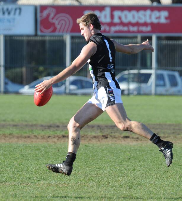 CLASS MIDFIELDER: Tommy Horne playing for Castlemaine in his best and fairest winning season in 2016. Horne, who was on Box Hill's list this year, is among the new recruits for Newbridge in 2018. Picture: NONI HYETT