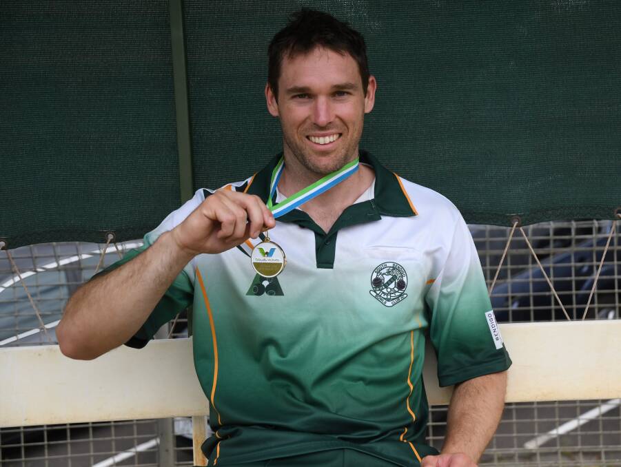 WELL BOWLED: South Bendigo's Mitch Sidebottom with his Victorian Open men's singles medal on Saturday. Picture: LUKE WEST
