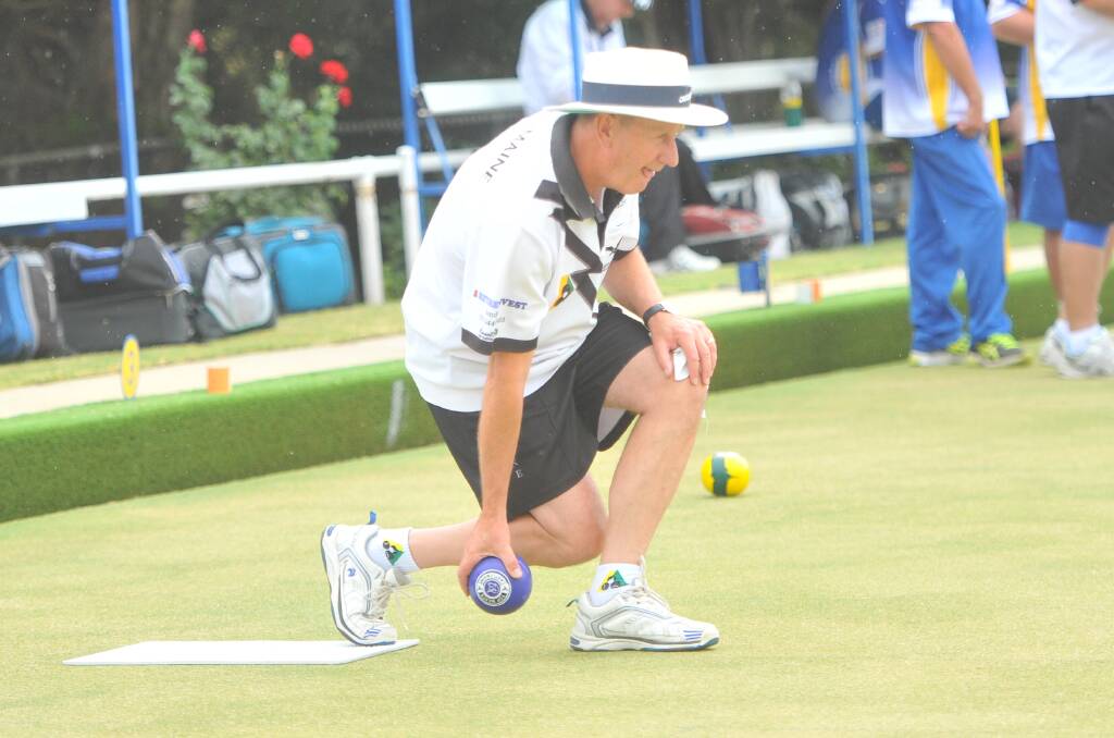 CONCENTRATION: Castlemaine's Neil Bouch bowls against Golden Square on Saturday. The Maine suffered  96-85 loss and is now on the bottom of the ladder.
