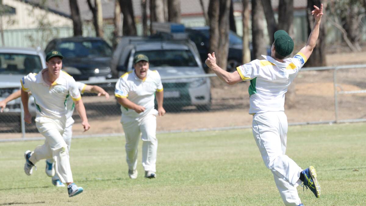 YOU BEAUTY: Spring Gully players close in on their premiership win against Sedgwick at Maiden Gully on Sunday. Picture: DARREN HOWE