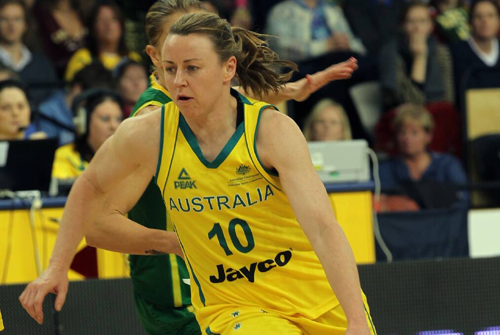GREEN AND GOLD: Kristi Harrower playing for Australia in 2012. Harrower won four Olympic medals with the Opals. Picture: AAP IMAGE