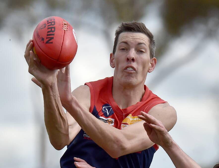 TALL TIMBER: Wycheproof-Narraport ruckman Chris Howgate was joint runner-up with team-mate Corey Jones in this year's Feeny Medal. The Demons play Birchip-Watchem in Saturday's NCFL grand final. Picture: NONI HYETT