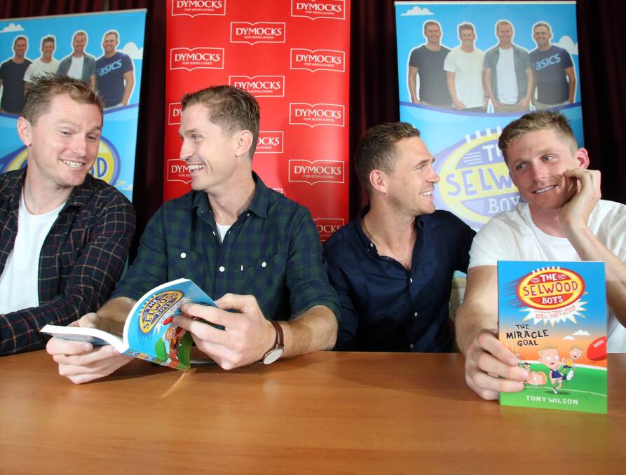NEW VENTURE: Bendigo brothers Troy, Adam, Joel and Scott Selwood returned to their hometown on Sunday for a book signing at the South Bendigo rooms for their new series, The Selwood Boys. Picture: GLENN DANIELS
