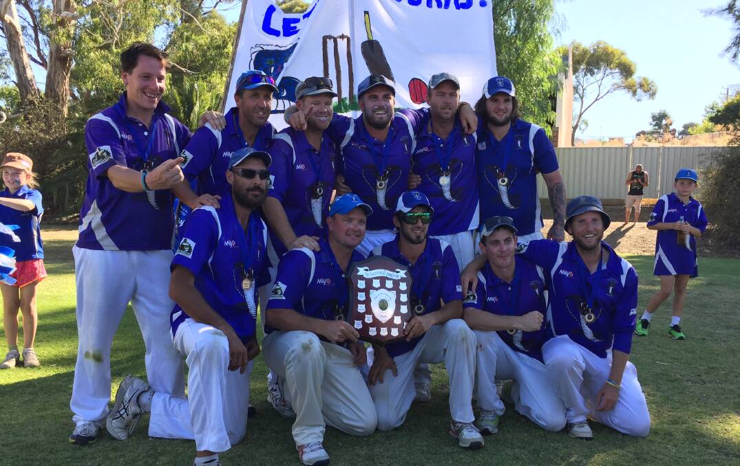 FLAG JOY AT LAST: The Golden Gully team that won the club's first division one premiership in the EVCA in March. Picture: LUKE WEST