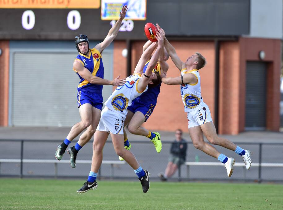 PACK FLIES: Action from Saturday's match between Heathcote District and Central Murray at the Queen Elizabeth Oval. Central Murray won by 43 points in a game in which it was never headed. Picture: GLENN DANIELS
