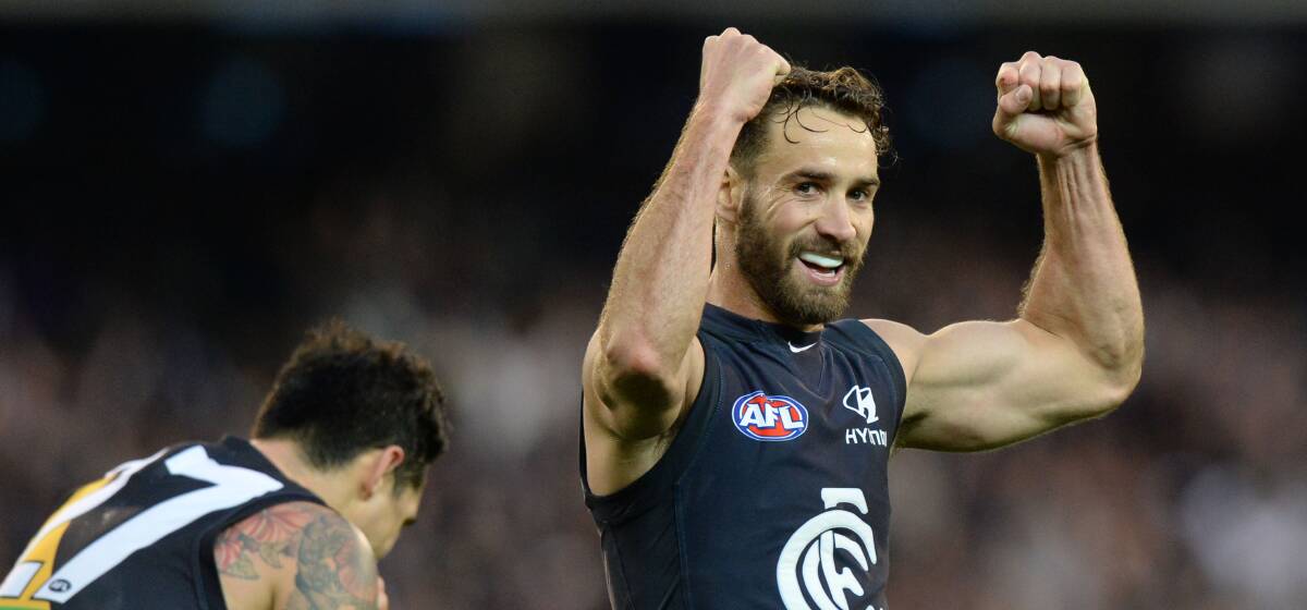 CELEBRATION: Andrew Walker after Carlton defeated Richmond by 20 points in the 2013 elimination final at the MCG, one of six finals he played in. Picture: GETTY IMAGES