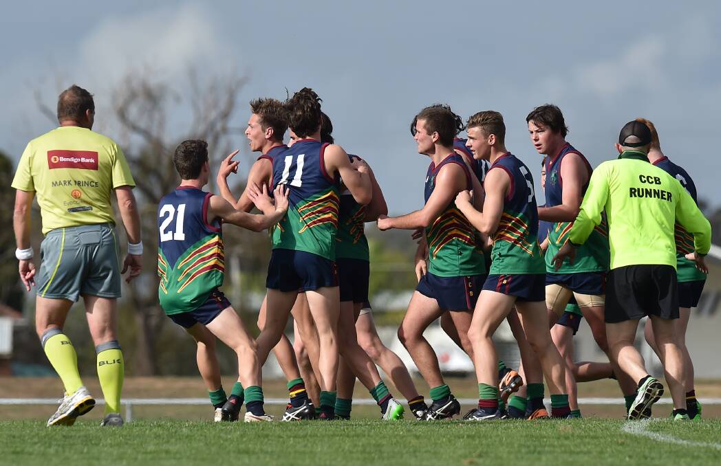 UP AND ABOUT: Catholic College Bendigo was too strong for Box Hill Secondary College on Wednesday, winning by 14 points. Picture: NONI HYETT