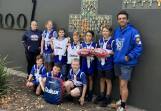 St Monica's Junior Football Club with some of the new training gear provided from AFL club North Melbourne. Picture contributied