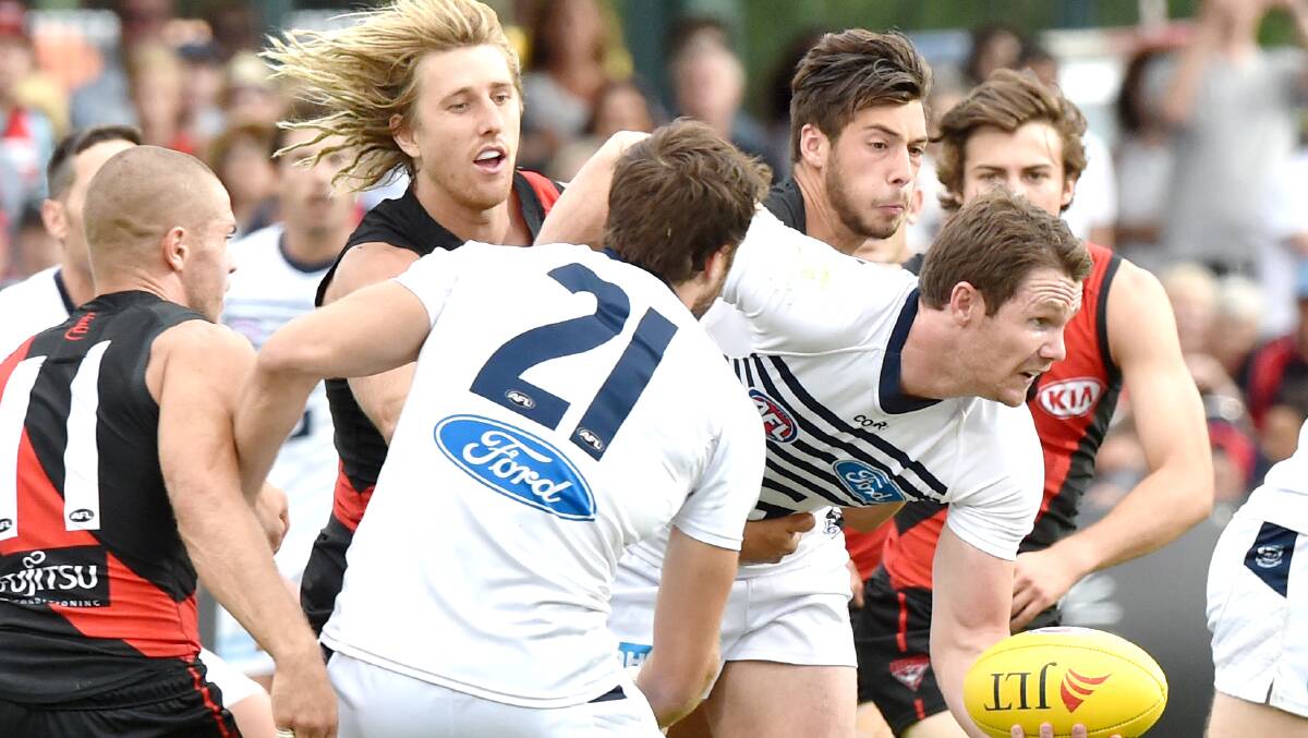 QUESTION 36 - Who were the two players who kicked four goals each in the Geelong-Essendon JLT Community Series match at the QEO.
