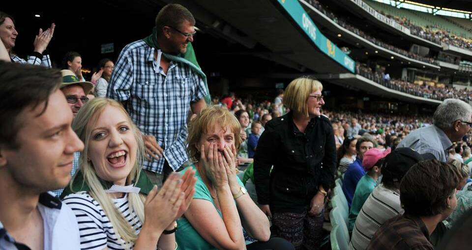 MAGIC MOMENT: Julie Bowe (aqua top) shows her emotion after step son Liam Bowe's wicket for the Melbourne Stars on Tuesday night. Picture: MELANIE CROOKSTON SMITH