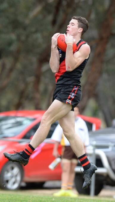 SWITCHING CLUBS: Joel Helman in action for Leitchville-Gunbower in 2015. He has now joined the Bombers' biggest rival, North Bendigo, in the HDFNL.