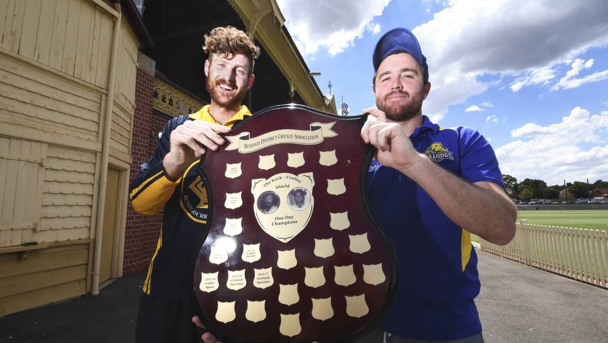 RIVAL CAPTAINS: Bendigo's Shane Koop and Golden Square's Ben Gunn with the BDCA's one-day Keck-Findlay Shield up for grabs on Friday. Picture: NONI HYETT