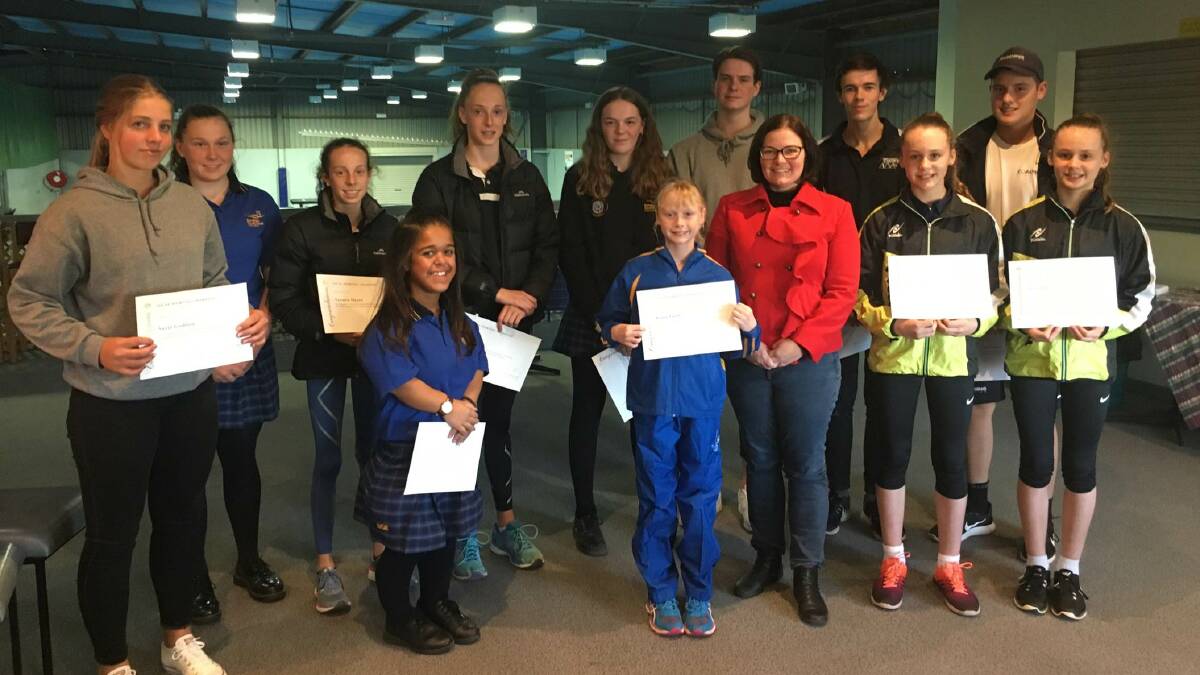 TALENTED: Bendigo MP Lisa Chesters (in red) with some of the Bendigo athletes who have received Local Sporting Champions grants. Picture: CONTRIBUTED