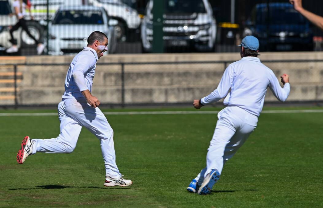 Suns' captain Cameron Taylor on the run after taking the final wicket of the grand final. Picture by Enzo Tomasiello