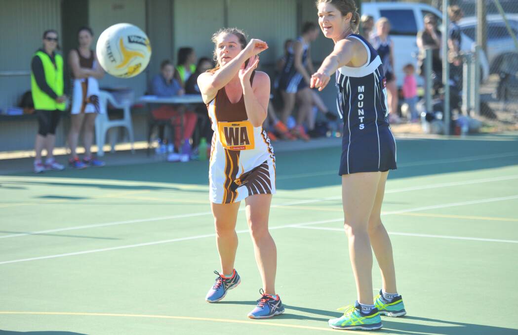 ROCKET PASS: Huntly wing attack Stephanie Riley moves the ball quick in Saturday's 48-31 A-grade netball win over Mount Pleasant. Picture: LUKE WEST