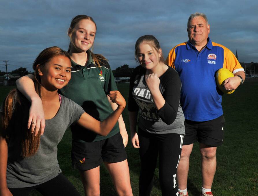 INAUGURAL SEASON: Thea Engbino, Chelby Clark and Keiley Adamson with new Golden Square Youth Girls coach Russell Jeffrey at training during the week. Picture: NONI HYETT