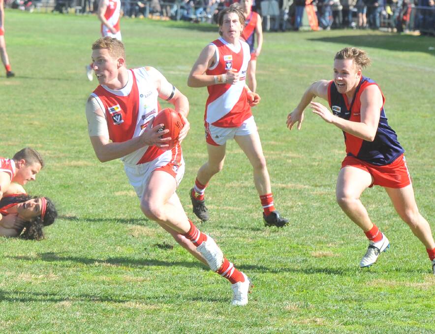 ON THE BURST: Kevin Bloom moves the ball forward for Bridgewater during Saturday's nine-point second semi-final win over Calivil United at Newbridge. The Mean Machine are through to their eighth Loddon Valley league grand final in a row. Picture: ADAM BOURKE