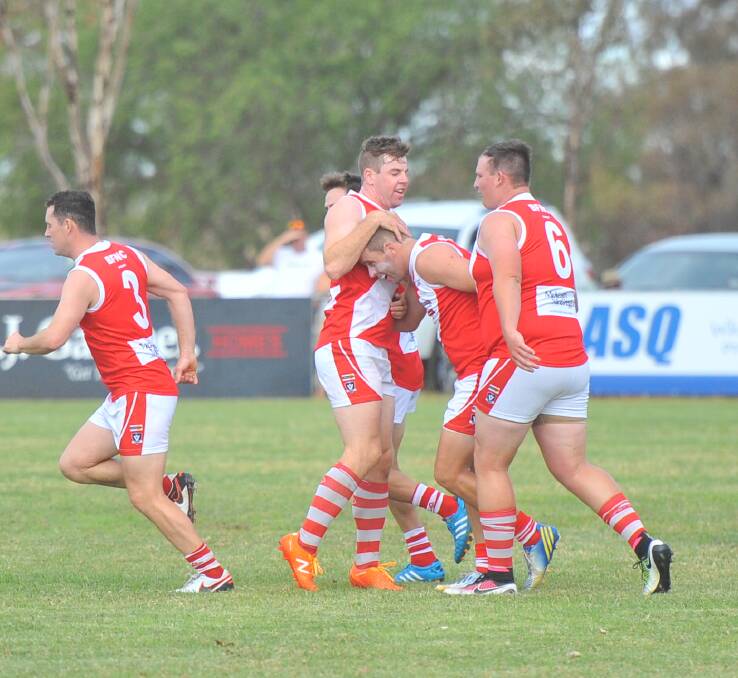 DOMINANT: Bridgewater players celebrate one of the 149 goals the undefeated Mean Machine has booted this season. This one was kicked by Rick Ladson in round one against Pyramid Hill. Picture: ADAM BOURKE