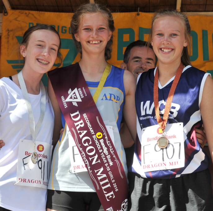 JOB WELL DONE: Zahra Hayes, Bridie Blake-Burrows and Gabrielle Rushbridge with their Year 9 and 10 female medals on Sunday.