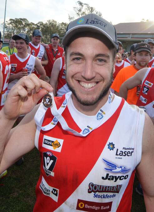 ALL SMILES: Bridgewater's Callum Prest with his best on ground medal.