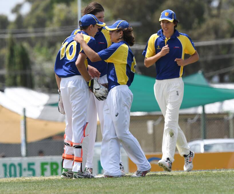 GOT HIM: Northern Rivers players celebrate a wicket against North East Country at Kangaroo Flat on Wednesday. Picture: NONI HYETT