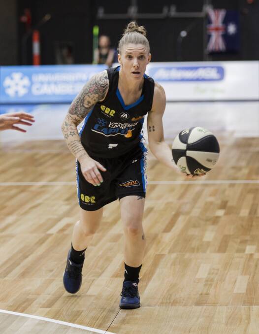 EXPERIENCED: Natalie Hurst playing one of her 247 career games for Canberra last season. Hurst won seven championships with Canberra. Picture: JAMILA TODERAS