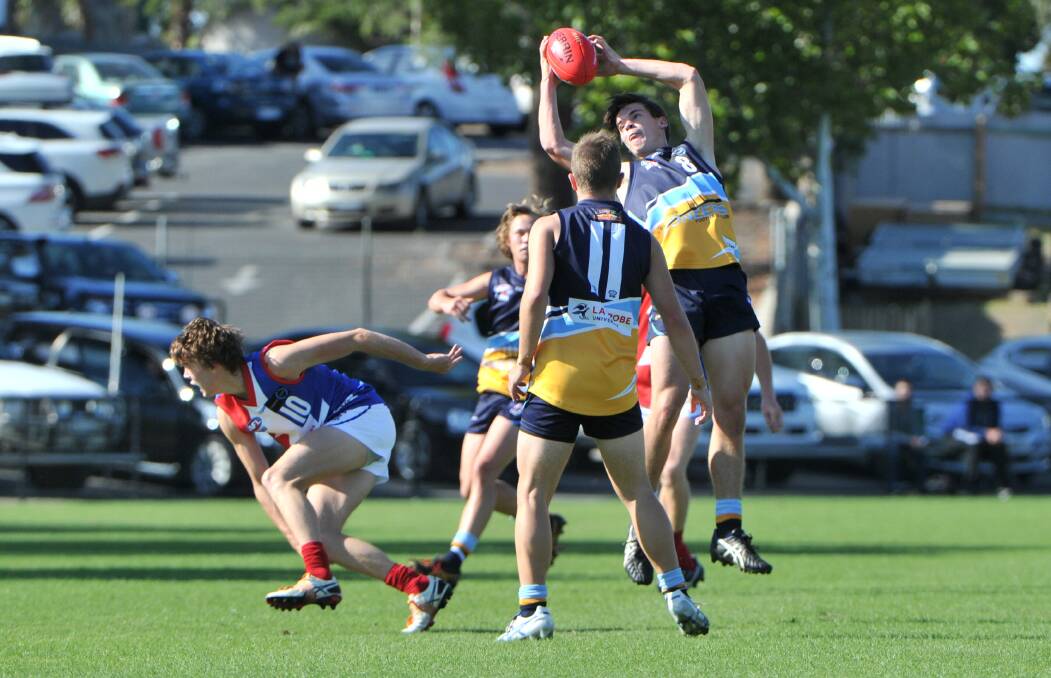 REMATCH: Bendigo Pioneer Paddy Dow marks against Gippsland at the QEO in round two. The Pioneers won that day by 43 points.