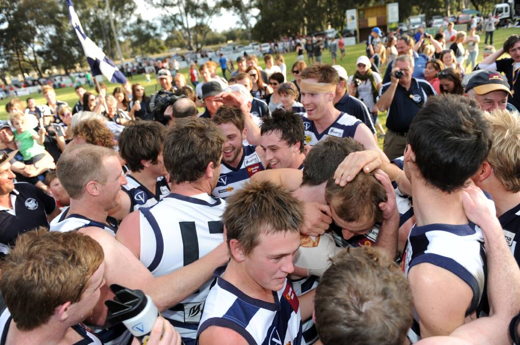 DAY TO SAVOUR: Lockington-Bamawm United celebrates its 2011 senior grand final win over Heathcote by six points. The Cats won all three football flags that day.