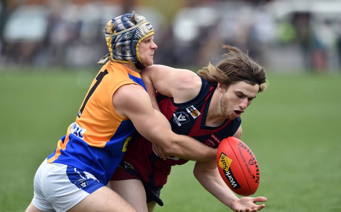 Golden Square's Clayton Anderson and Sandhurst's Lachlan Ross. Picture: GLENN DANIELS